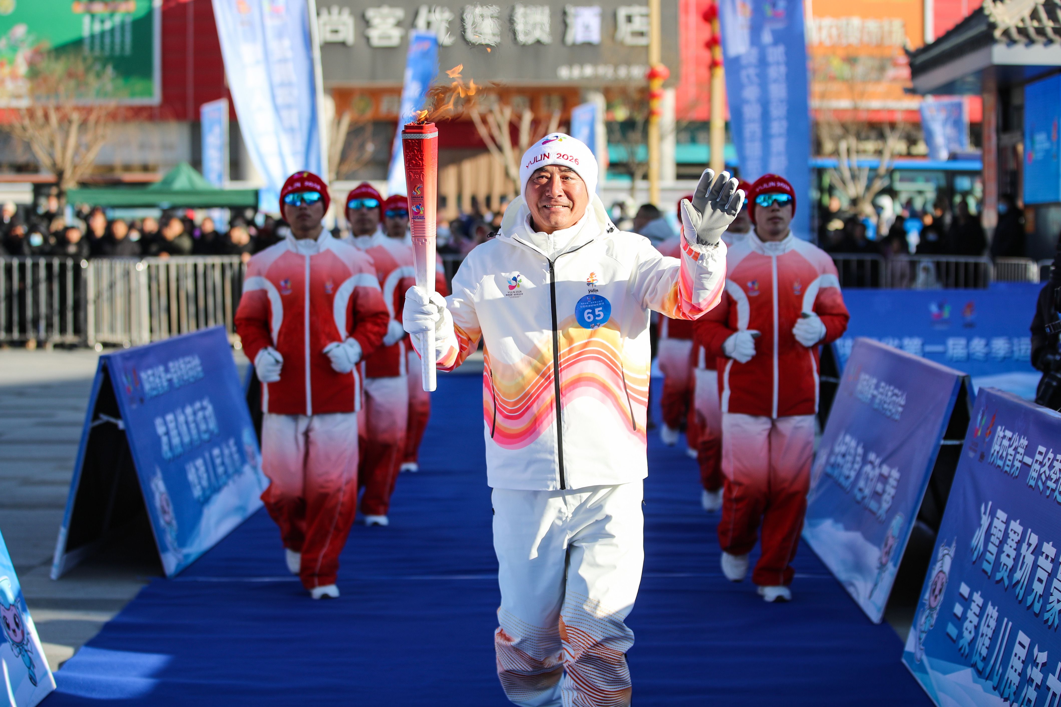 东方红日映冰雪 黄河之畔传火炬——省一冬会火炬传递榆林佳县站活动侧记